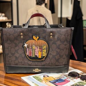 Coach Brown Signature Tote with Pink Trim and Gold Patch